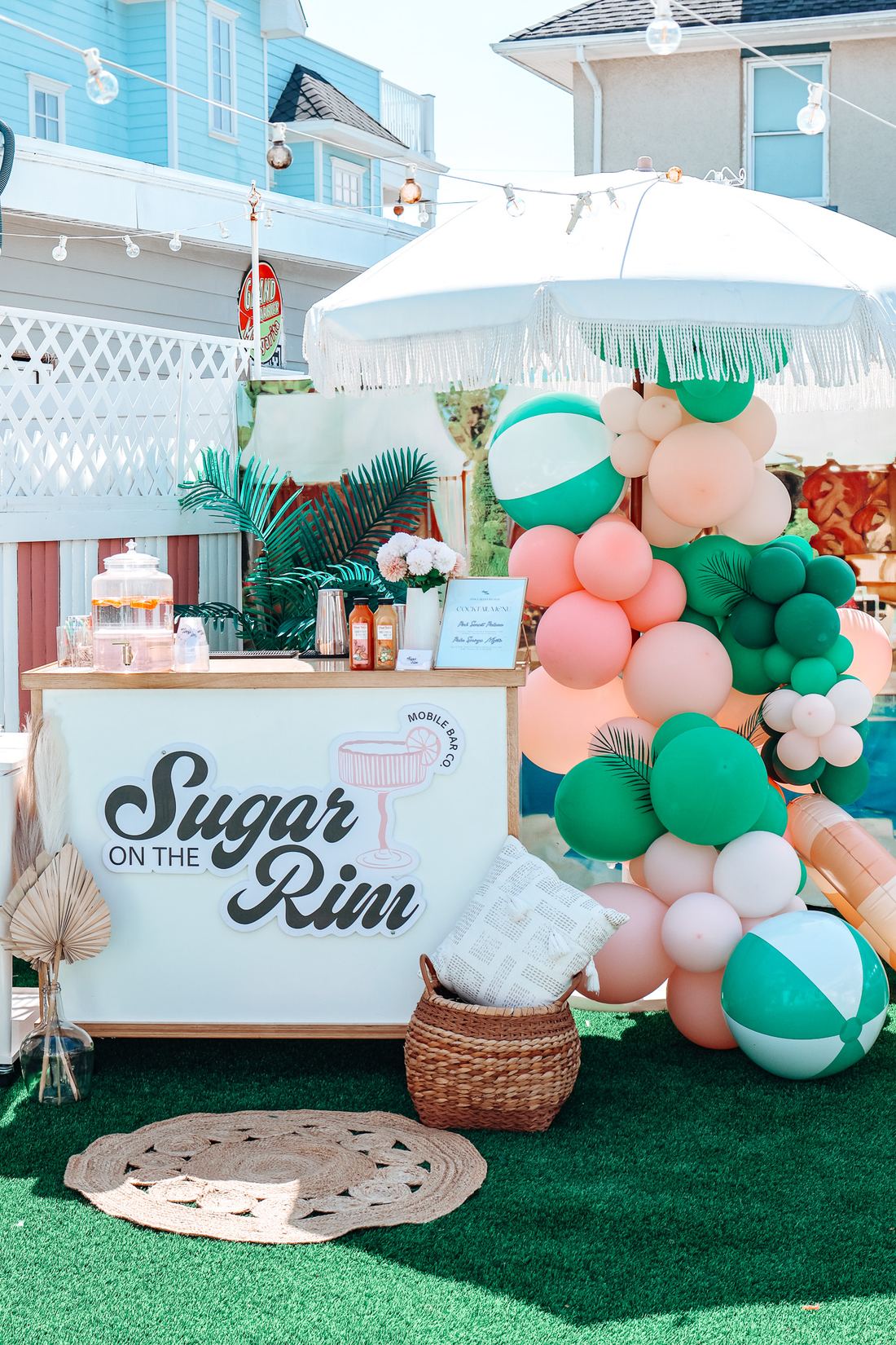 Sugar On The Rim branded mobile cocktail bar setup with balloon styling at a New Jersey event